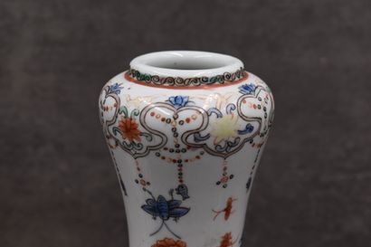 CHINA. Pair of white porcelain vases decorated...