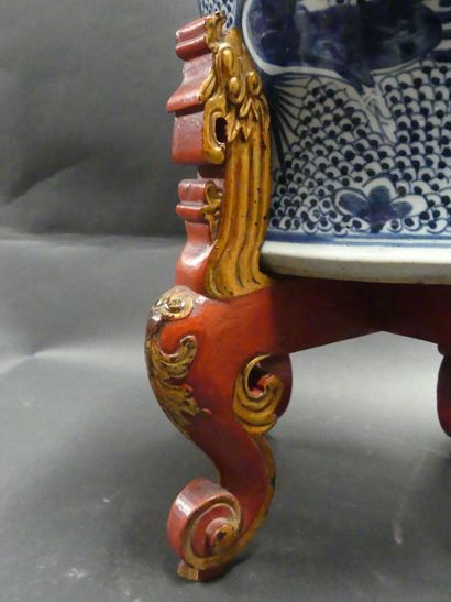 Asia, vase in blue white resting on a wooden...