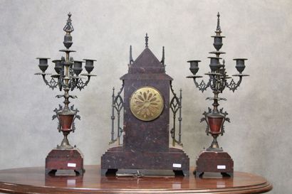 Clock in the shape of a gothic church and...