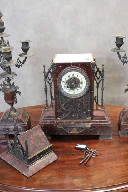 Clock in the shape of a gothic church and...