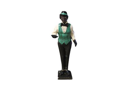 Majordome
Plaster statue of a black man in...