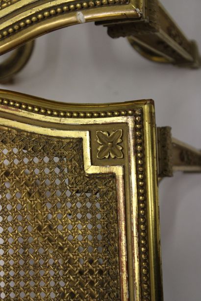 Pair of stools in carved and gilded wood...