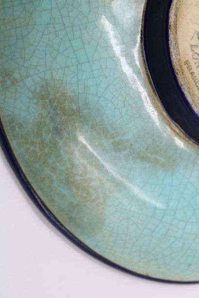 Meeting of two plates one in porcelain with...