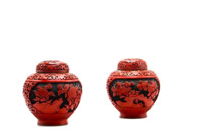 CHINA. Pair of covered pots in red lacquered...