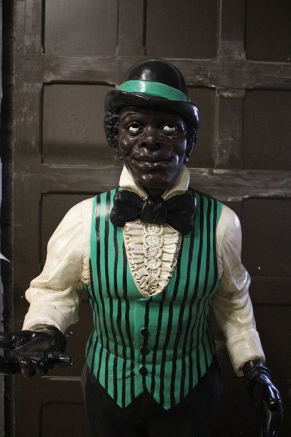 Majordome
Plaster statue of a black man in...