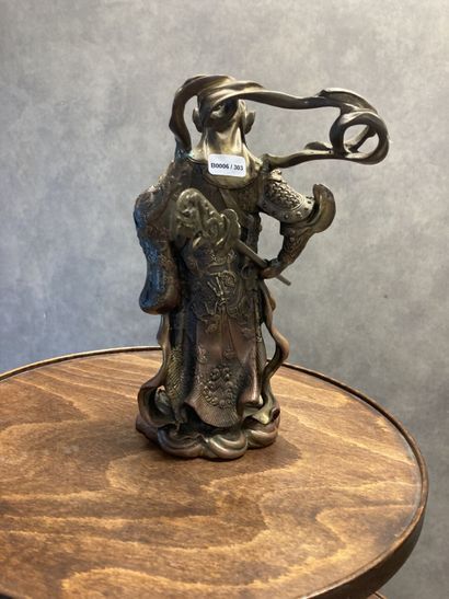 Bronze representing a man with a spear in...