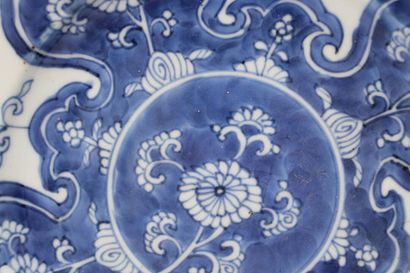 CHINA. Meeting of four blue enameled porcelain...