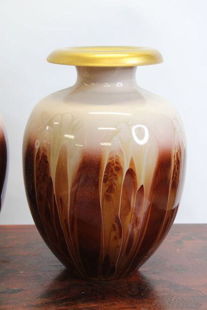 Pair of blown glass vases with shaded decoration...