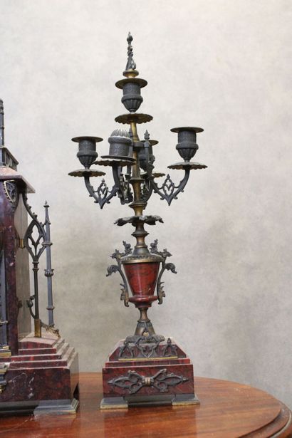 Clock in the shape of a gothic church and...