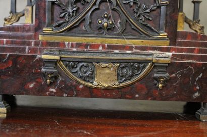 Clock in the shape of a gothic church and...