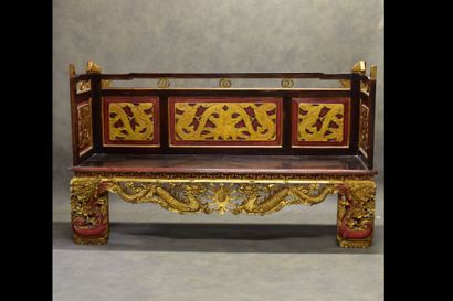 CHINA. Sofa-bench in carved and molded wood...