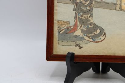 JAPAN. Polychrome print showing a woman in...
