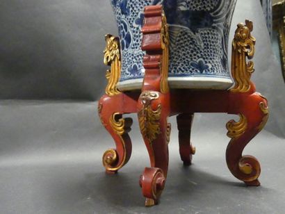 Asia, vase in blue white resting on a wooden...