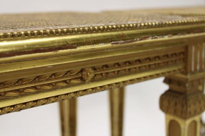Pair of stools in carved and gilded wood...