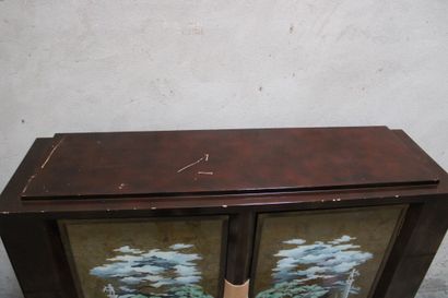 Buffet
Lacquered wood cabinet opening by...