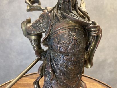 Bronze representing a man with a spear in...