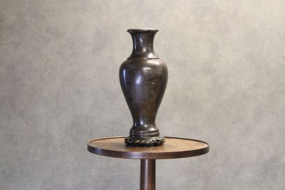 ASIE
Vase of baluster form in patinated bronze...