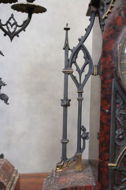 Clock in the shape of a gothic church and...