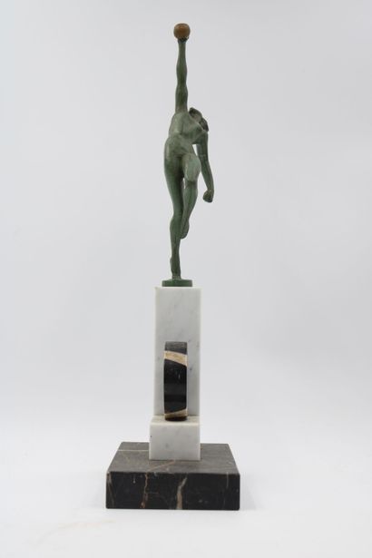 ART DECO 
Woman with a ball, green patinated...