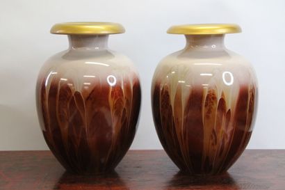Pair of blown glass vases with shaded decoration...