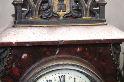 Clock in the shape of a gothic church and...