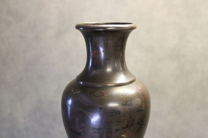 ASIE
Vase of baluster form in patinated bronze...