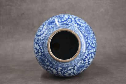 CHINA. Porcelain covered vase with blue flowers....