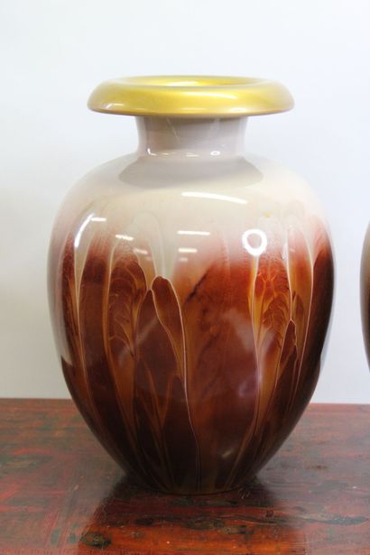 Pair of blown glass vases with shaded decoration...