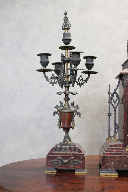 Clock in the shape of a gothic church and...