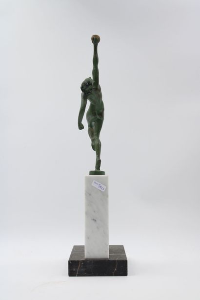 ART DECO 
Woman with a ball, green patinated...