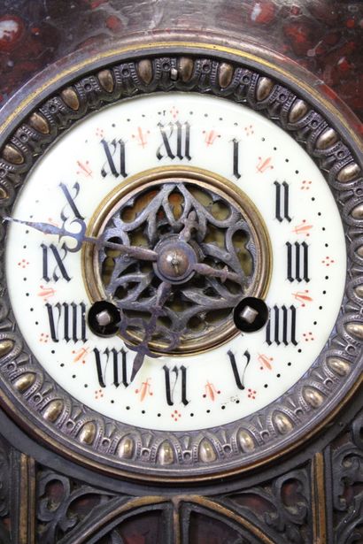 Clock in the shape of a gothic church and...