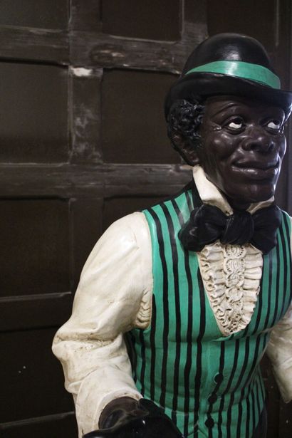 Majordome
Plaster statue of a black man in...