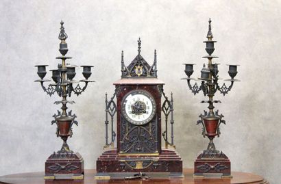 Clock in the shape of a gothic church and...