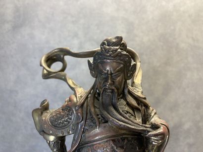 Bronze representing a man with a spear in...