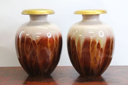 Pair of blown glass vases with shaded decoration...