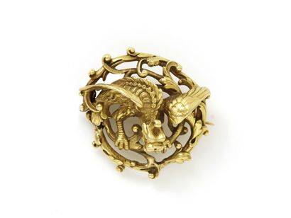Broche en or 750 millièmes, de forme ronde...