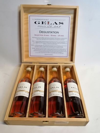 
ARMAGNAC, GELAS Wooden tasting box 4 bottles...