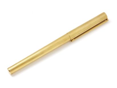 DUPONT

Stylo à bille en métal doré à décor...