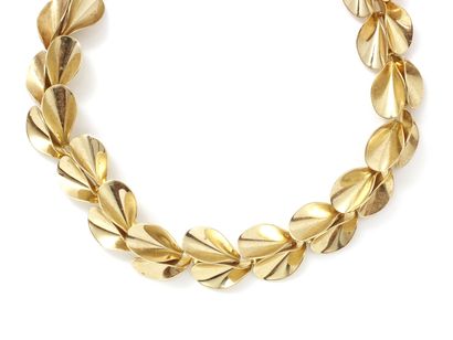 Chr. DIOR

Collier articulé en métal doré,...