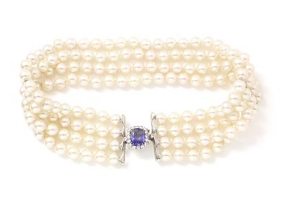 Collier de chien composé de 4 rangs de perles...