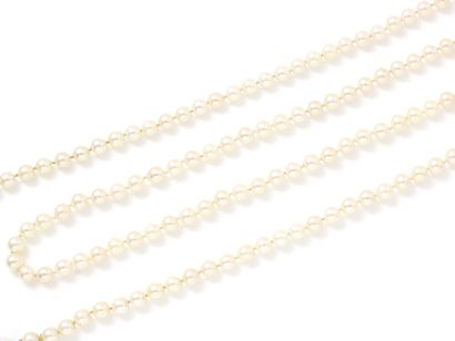 Long necklace composed of cultured pearls...