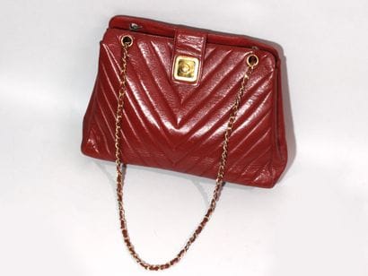 CARTIER ''must have'' clutch bag
Burgundy...