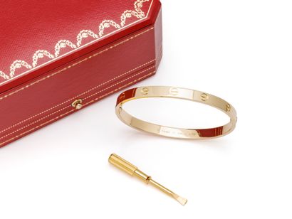 CARTIER ''LOVE
Openwork bangle in 750 thousandths...