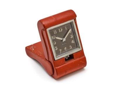 HERMÈS
Travel alarm clock in silvered metal...