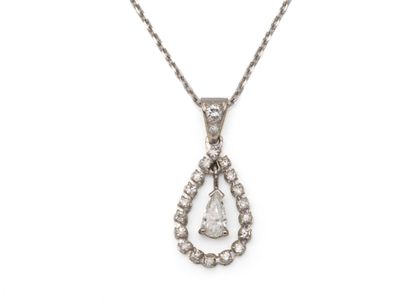 A pear-shaped pendant in 750 thousandths...