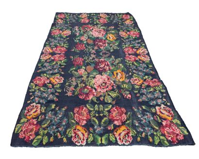 Moldavian wool carpet decorated with roses...