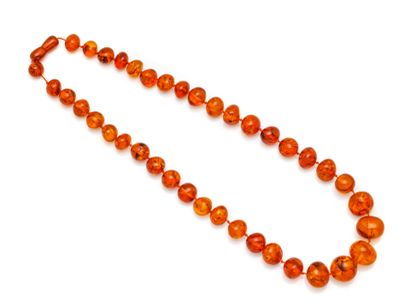 Necklace composed of a drop of amber beads,...