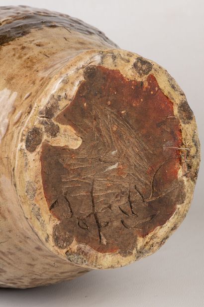 Brown glazed stoneware baluster vase, restoration...