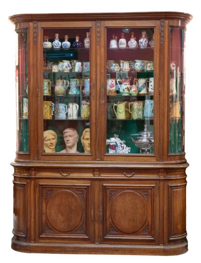 A large Louis XVI style double cabinet. Four...