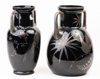 Suite of two eglomised glass vases with handles,...